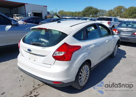 2012 Ford Focus Titanium z USA, uszkodzony, nr VIN 1FAHP3N29CL235368